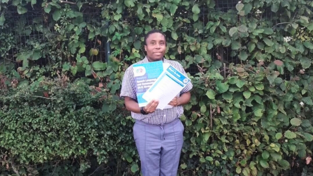 troy with his certificate